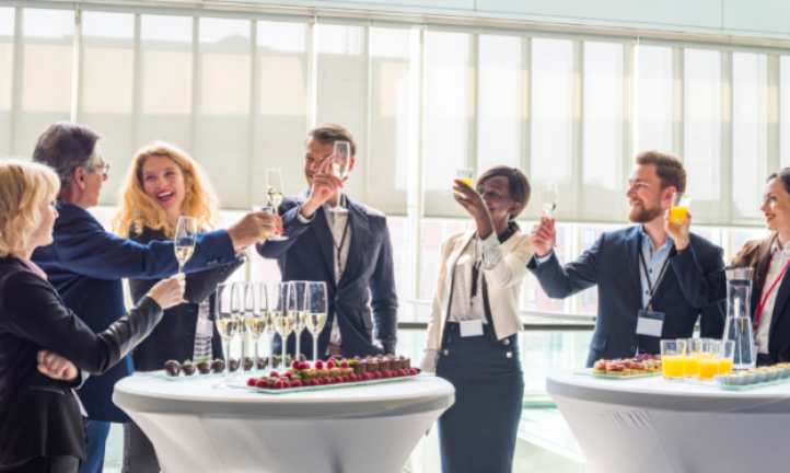 Group of business people toasting with champagne