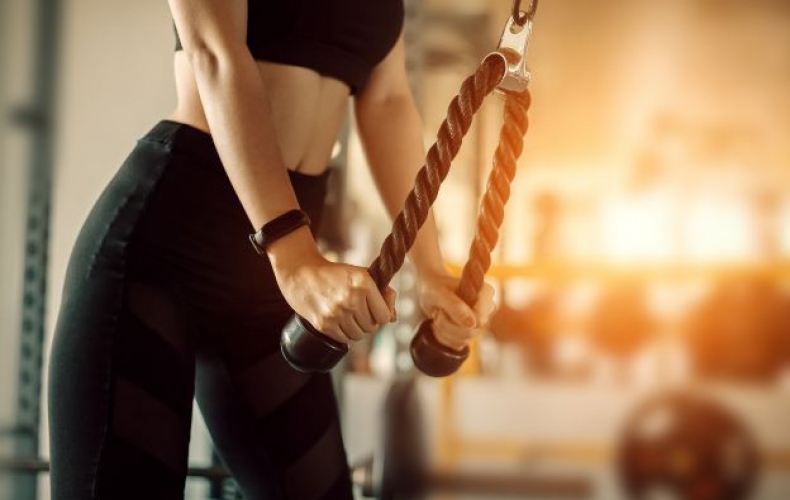 girl working out with rope