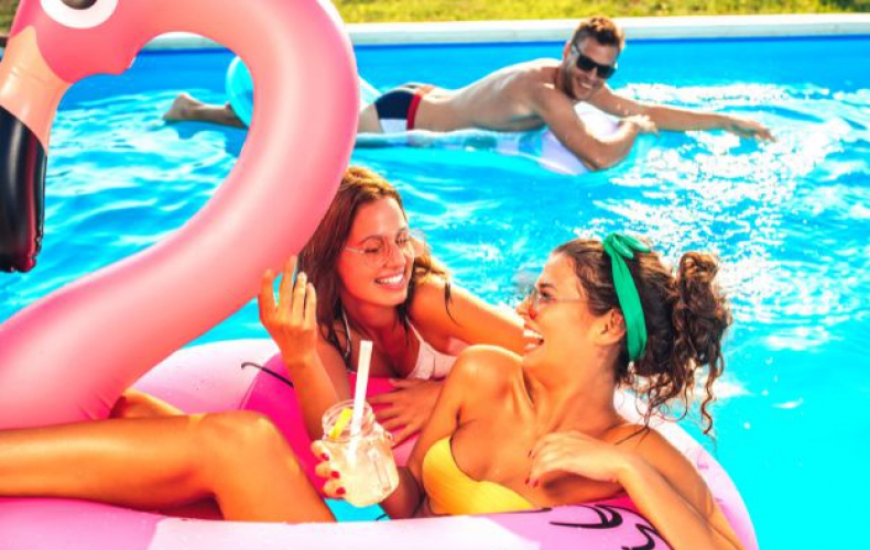 Girls enjoying in the pool