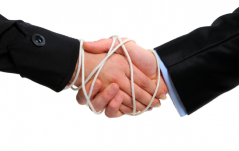 Two men shaking hands with white rope binding them