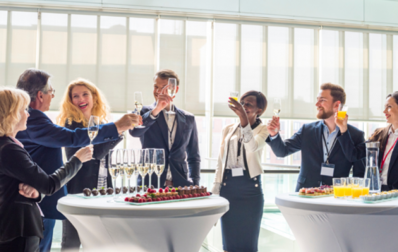 Group of business people toasting with champagne